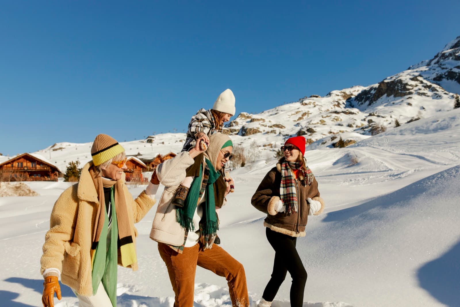 Friends in the snow at a Club Med alpine village