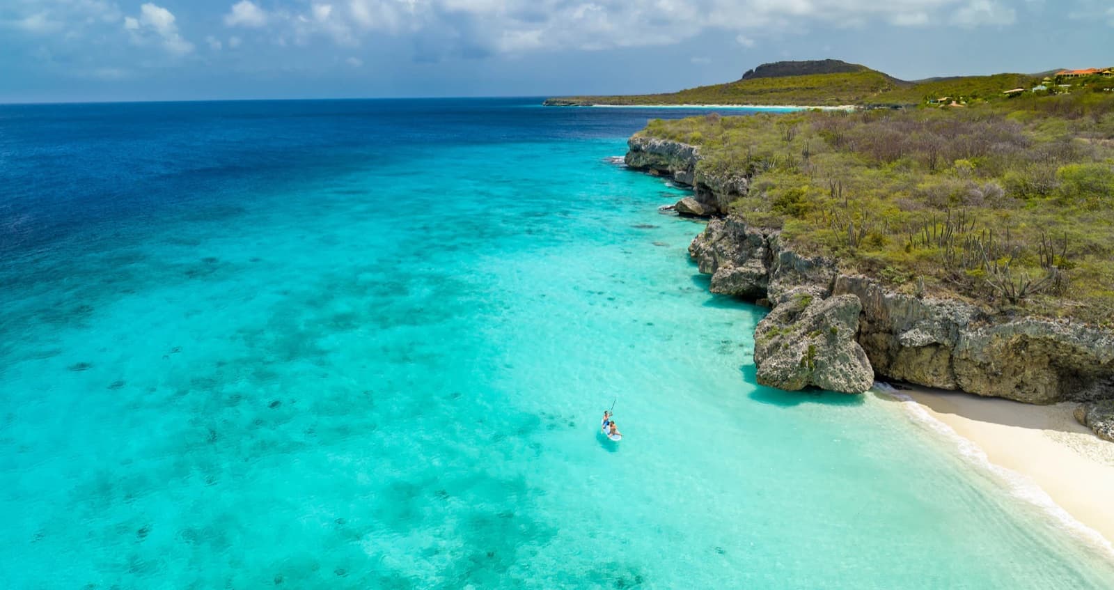 Infinity pool and ocean at Sandals Royal Curaçao