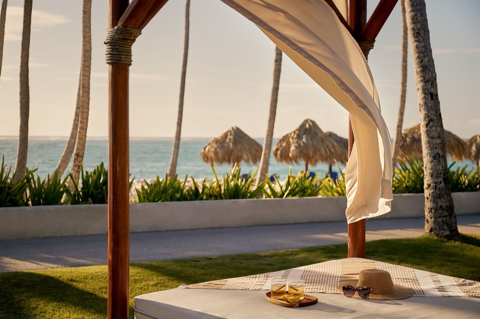 Beachfront daybed at sunset, Club Med Punta Cana