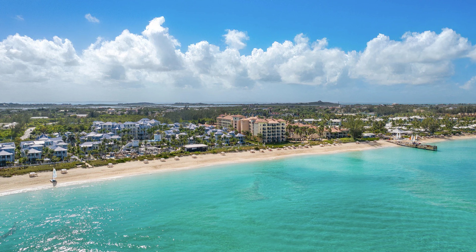 Aerial of a Beaches family resort along a turquoise bay