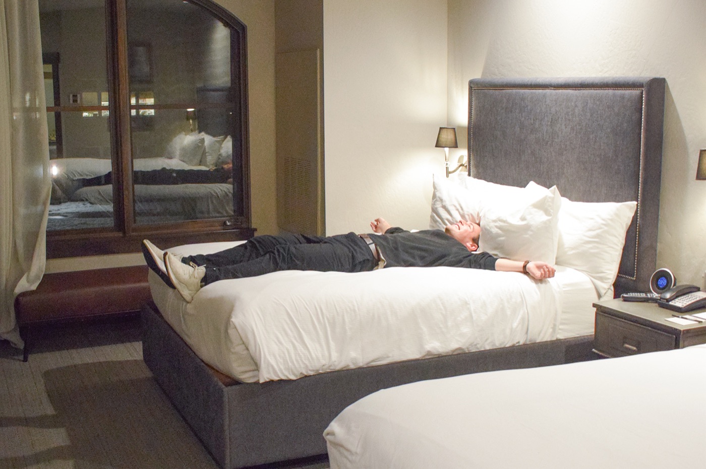 A guest flopped happily onto a plush double bed in a Firebrand Hotel room